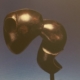 La bête, 1980, bronze patiné brun, cm 38 x 20 x11,5